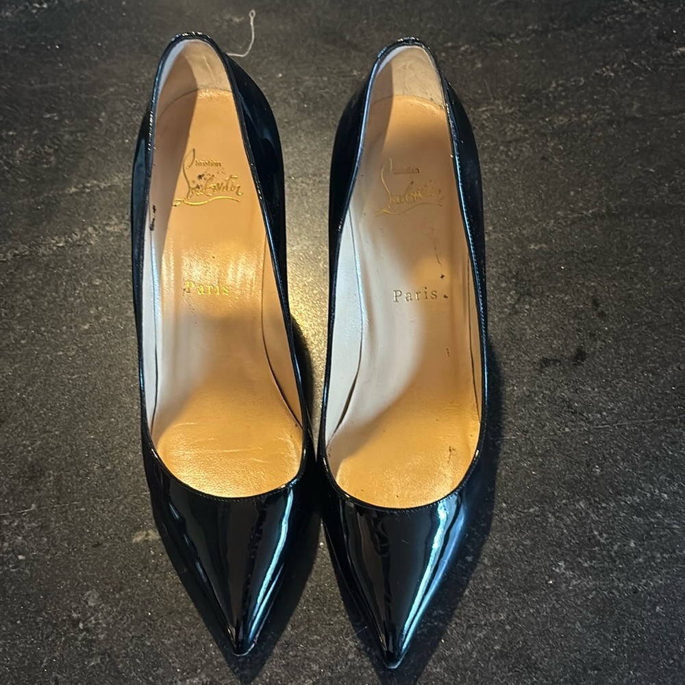 Black Christian Louboutin Size 38.5 (8.5). Worn a handful of times.